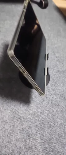 OrbitStand™ – 360° Rotating Aluminum Phone Holder. photo review