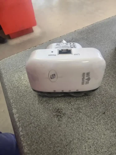 Universal WiFi Signal Booster - Long-Range WiFi Extender with Easy Plug photo review